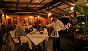 Dining on the deck of the Orient Pandaw.