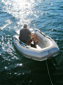 Fixing the dinghy in the Spanish Virgin Islands.