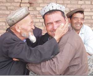 Rough play in the market at Kashgar