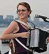 The author plays her accordian.