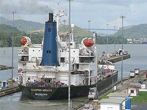 A ship leave Miraflores on the Panama Canal.