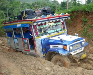 Riding up the mountain with the accompanying mud-times.