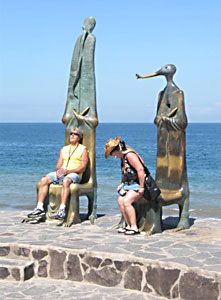 The sculptures on the Rotunda of the Sea serve as a rest stop along The Malecon. 