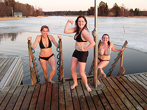 Preparing to take a dip in the hole in the ice