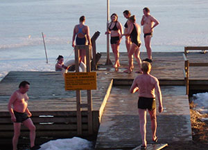 A group from the sauna makes its way down the dock