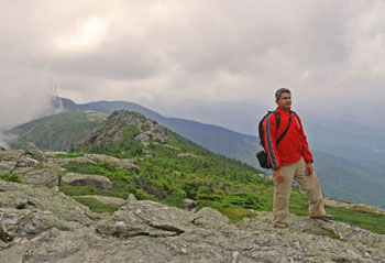 Pinaki on the Long Trail of Mount Mansfield. He finally takes a break from clicking photographs to enjoy the scenery. A candid shot by Esha Samajpati.