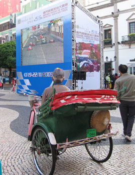 Video monitors are set up around the city.