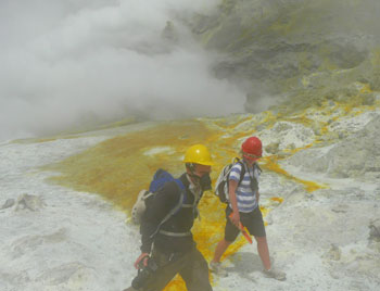 Visitors to White Island must don gas masks.