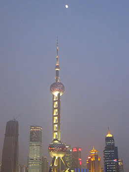 The Oriental Pearl Tower is the third tallest television tower in the world and the tallest in China. It is also home to the highest revolving restaurant in Asia.