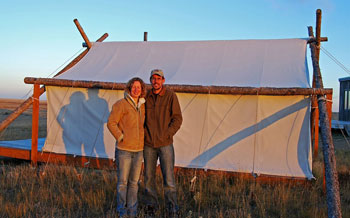 Sarah and Jacob Dusek, owners of Sage Safaris. The tent in the background is for 'glampers'.