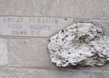 The walls of the Tribune Tower house famous rocks from all over the world. In this case, a piece of the Great Pyramid is shown.