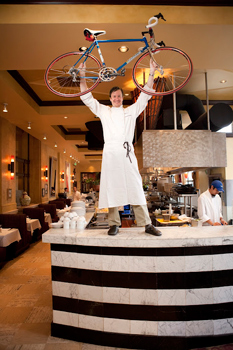 Bambara Bistro chef shows off his prized bicycle. photos by Sonja Stark.