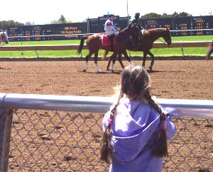 The author's daughter looks for liekly picks. Photos by Tim Leffel.