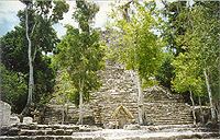 La Iglesia Pyramid with its thatch-covered stela standing sentinel at the bottom. 