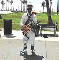 A musician in Venice Beach, California. Bill Karz photos.