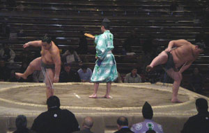 Spectators start to arrive as the middle-ranked sumo wrestlers meet in Japan.