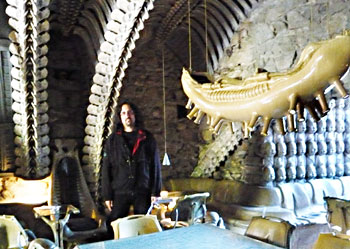 Inside the Giger Bar, with concrete vertebrae ceilings and dead babies on the wall