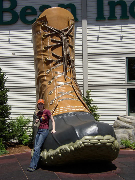 The author in front of the boot at the L.L. Bean retail store in Freeport, Maine