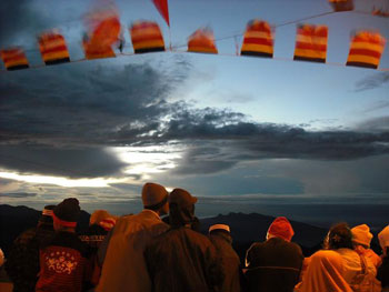 Prayer flags flutter in the wind.