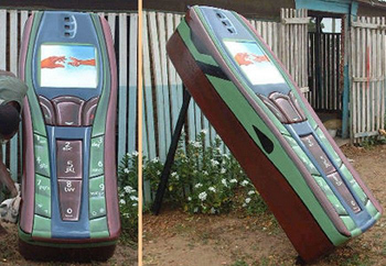Cellphone coffin. I am still trying to figure out why someone would want to be buried in this.