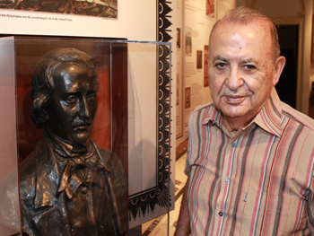 The author with a bust of Edgar Allan Poe at the Poe's historic home in Philadelphia. Photos by Habeed Salloum.