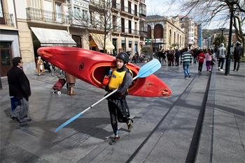 Kayaker on the streets of San Sebastian, Spain. photo: Paul Shoul.