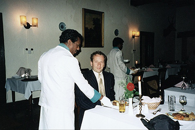 The author being served a ridiculous supper at the Victorian Hill Club