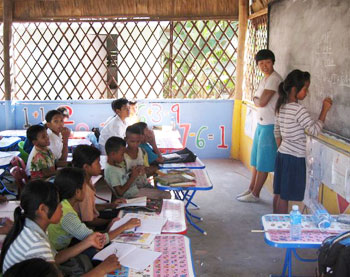 The children were eager to write on the board.