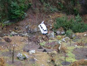 A wreck at the foot of a cliff on the way to Shringi. Don't drink and drive!