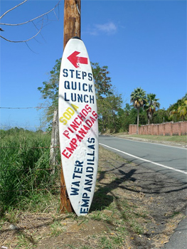 Sign tells surfers where to eat in Rincon, Puerto Rico. 