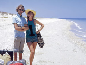 Tony and Maureen Wheeler on a beach in Australia