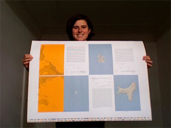 Judith Schalansky with her maps from her book Atlas of Remote Islands: Fifty Islands I Have Never Set Foot On and Never Will.