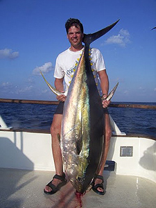 Charlie with a huge tuna caught off the shores of Clipperton. photo by Charles Veley.