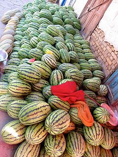 Melon mounds line the roads in Kashgar Old Town.