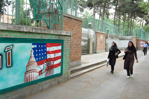 Thirty years later, the former American embassy is still lined with political posters struggling to provide Iranians with an enemy.