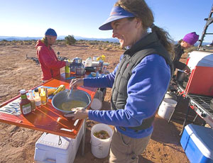 Maggie whips up our morning nosh at Airport Tower campground.