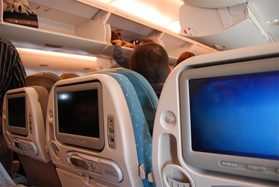 Inside the A380. Notice the sleeker luggage bins and lighting. http://www.flickr.com/photos/cheekeongfoo/