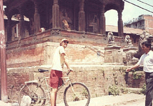 How to lose weight while travelling: One way is to ride a bike, as author Tim Leffel is doing here in India.