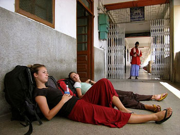 Backpackers waiting for a train 