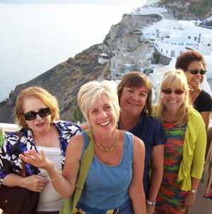 Making new friends in Santorini with Singles Travel International. Photo by Singles Travel International.