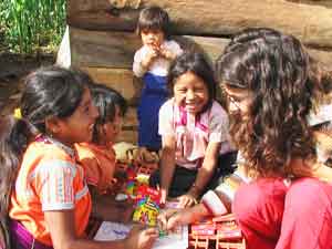 Stephanie Elizondo Griest with children in Mexico