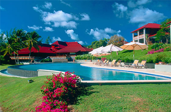 Pool at Cap Est Martinique A crescent-shaped turquoise expanse.