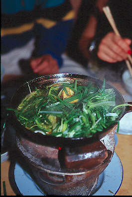 A Taste of Hanoi's Braised Fish Street 7 Braised fish sauteed with fresh herbs at Cha Ca La Vong Restaurant.