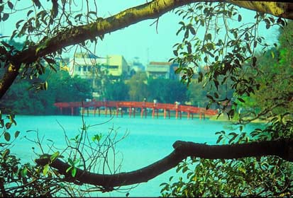 A Taste of Hanoi's Braised Fish Street 3 Rising Sun Bridge leads to Ngoc Son Temple in Lake Hoan Kiem, in Hanoi.