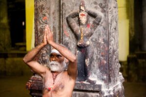 An Indian Sadhu performing a ritual in India. Claude Renault photo.