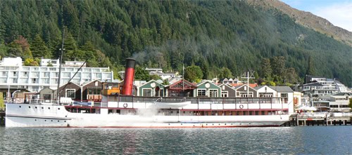 The steamer TSS Earnslaw makes regular trips to High Peak Farm at the end of the lake in Queenstown, NZ. photo by Max Hartshorne.