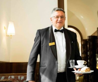 Professional cafe waiter at Cafe Landtmann in Vienna Austria.
