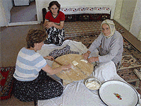 Blown Away in Cappadocia 7 Women of the Serim family preparing 'pufburek' for lunch. Catherine Stryker photo.