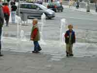 Salzburg is full of fountains, much to the delight of the kids.