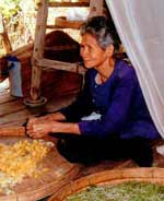 Isan in Northern Thailand, Undamaged by Tsunami 4 Silk weaver in Isan.